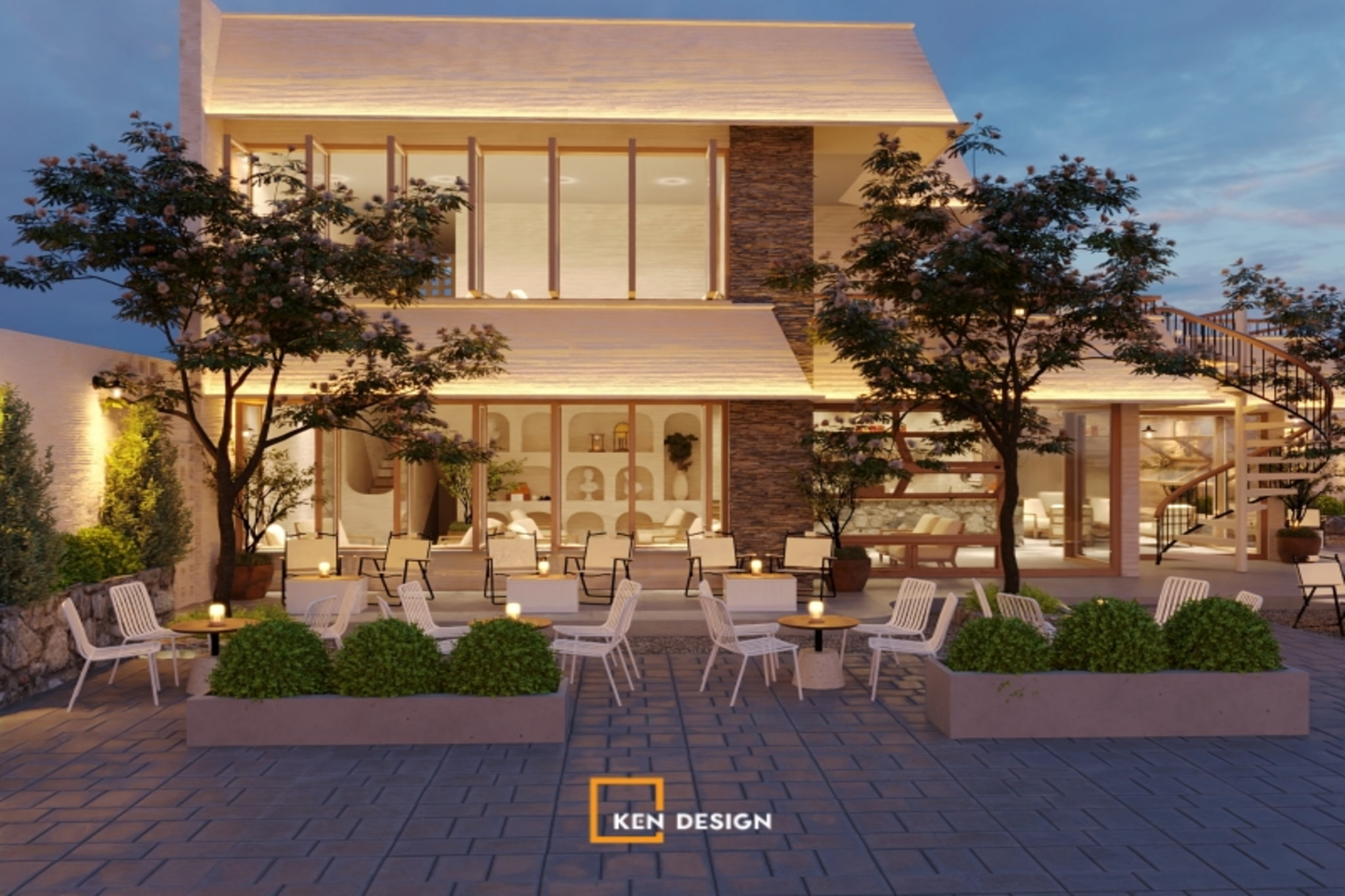 sân vườn về đêm có ghế lưới trắng, nến và cầu thang xoắn bên hông quán cafe phong cách hiện đại